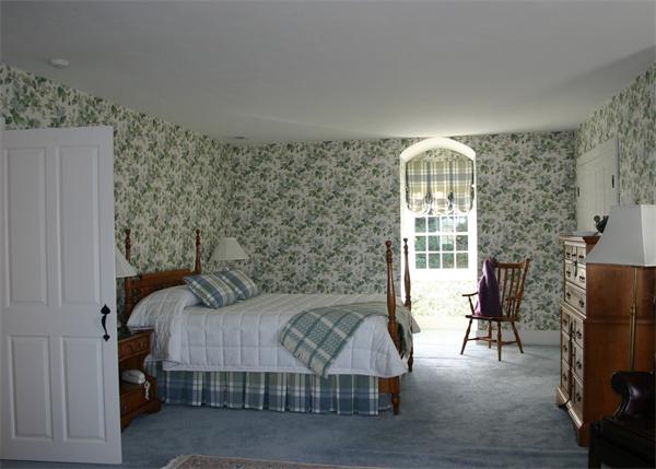 188 Prospect Hill Road Harvard, MA 01451 - Photo 22 of 30 a bedroom with a bed and a window