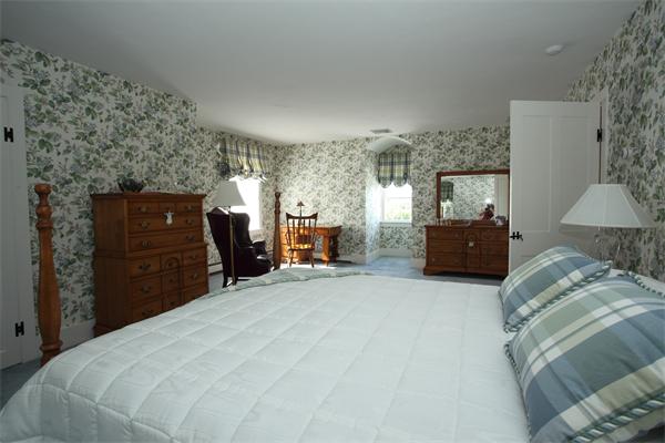 188 Prospect Hill Road Harvard, MA 01451 - Photo 23 of 30 a bedroom with a bed and dresser