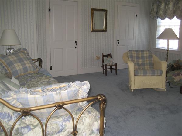 188 Prospect Hill Road Harvard, MA 01451 - Photo 24 of 30 a room with a couch and a chandelier