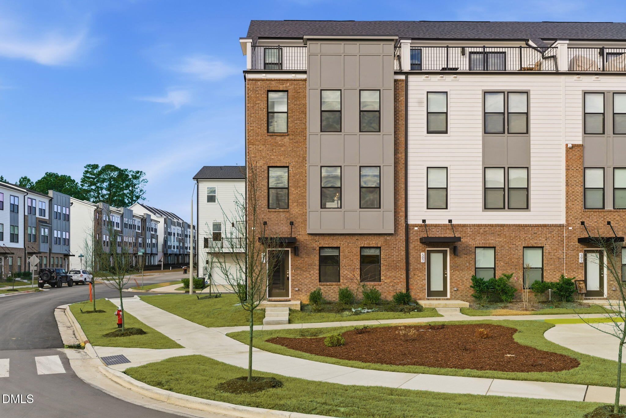 a view of a building with a yard