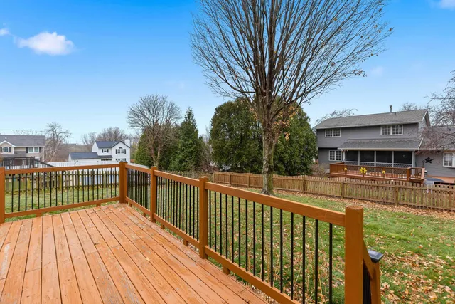 a view of a room with wooden walls