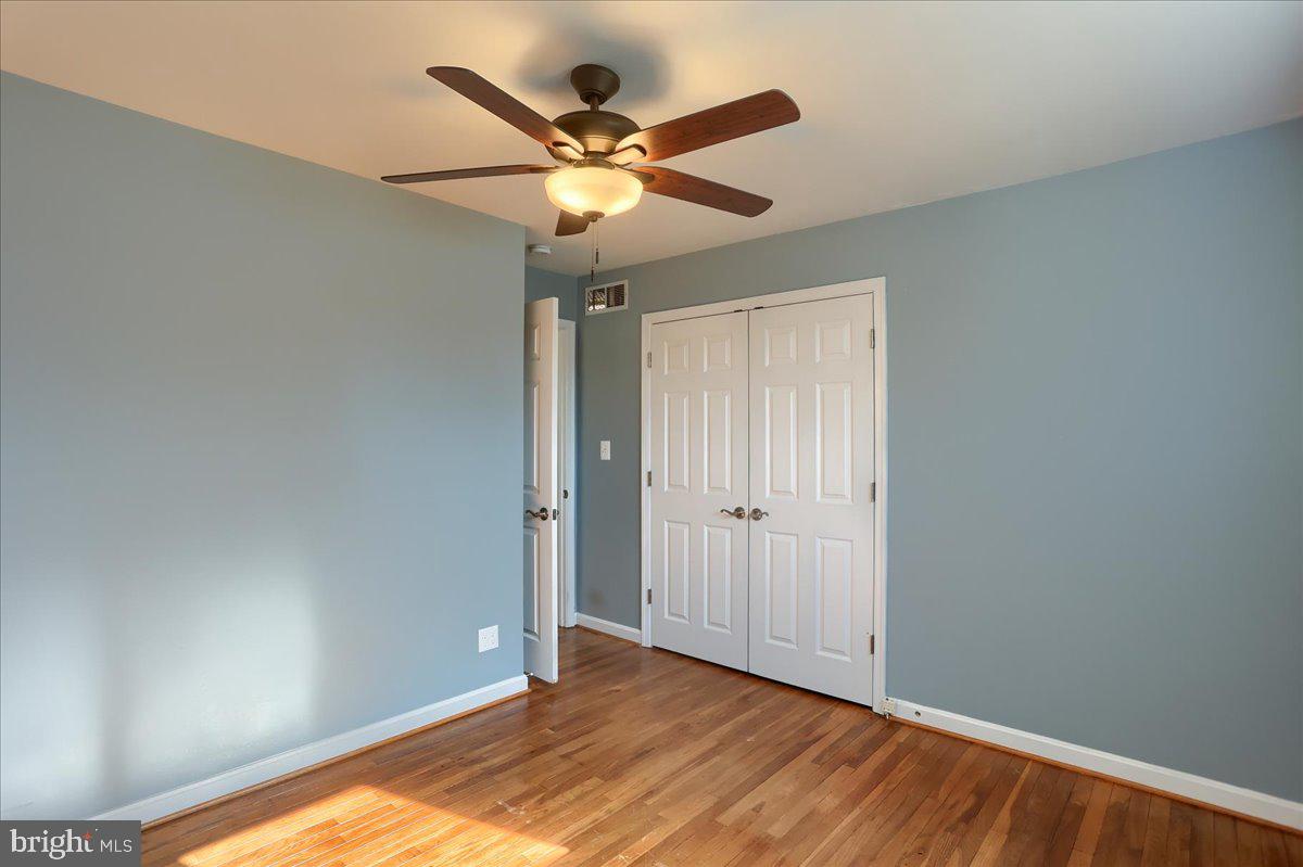 104 Cedarcliff Court Glen Burnie, MD 21060 - Photo 15 of 34 a view of room with wooden floor