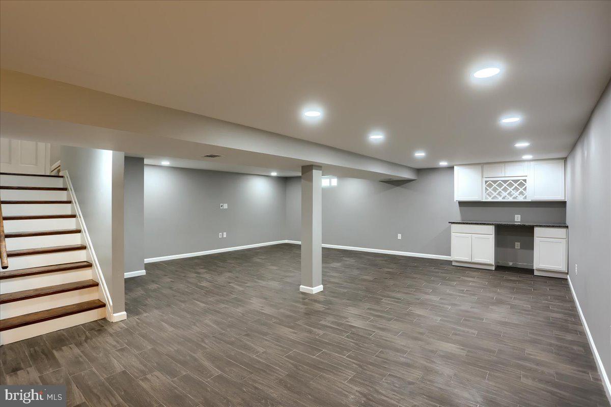 104 Cedarcliff Court Glen Burnie, MD 21060 - Photo 19 of 34 a view of an empty room with wooden floor