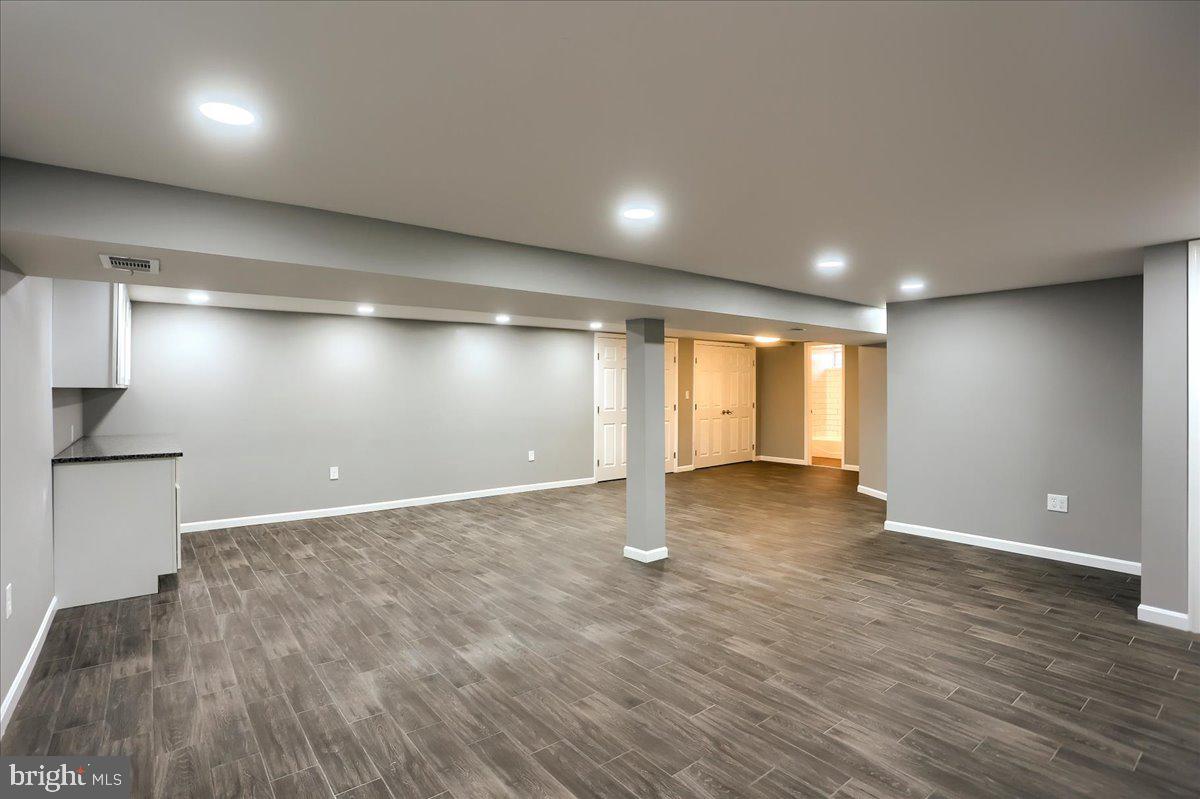 104 Cedarcliff Court Glen Burnie, MD 21060 - Photo 21 of 34 a view of an empty room with wooden floor
