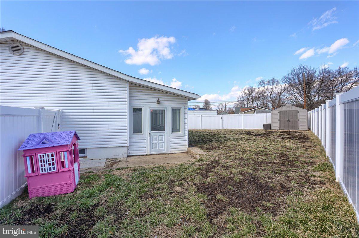 104 Cedarcliff Court Glen Burnie, MD 21060 - Photo 27 of 34 a view of a house with a yard