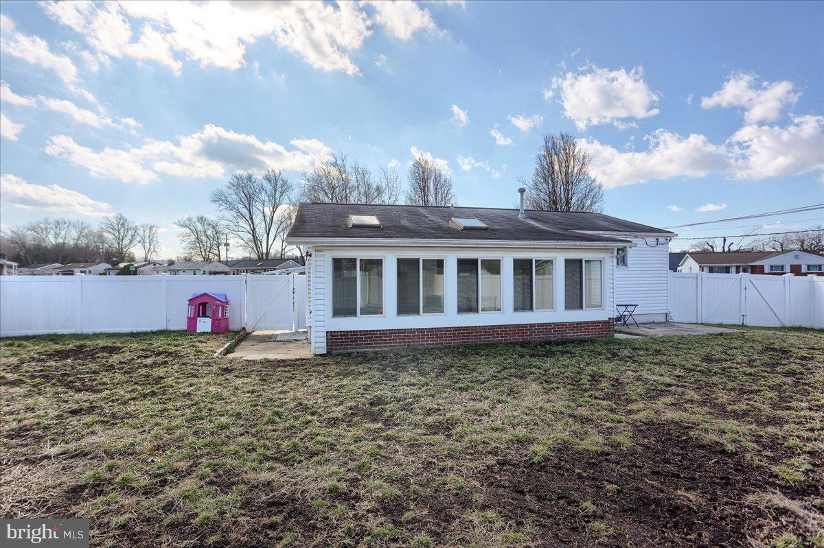 104 Cedarcliff Court Glen Burnie, MD 21060 - Photo 28 of 34 a view of a house with a backyard
