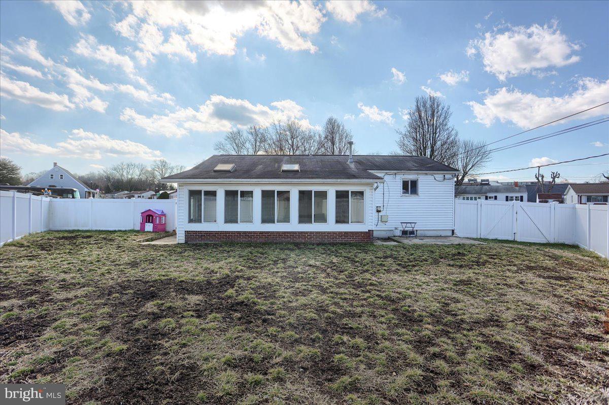 104 Cedarcliff Court Glen Burnie, MD 21060 - Photo 29 of 34 a view of a house with a backyard