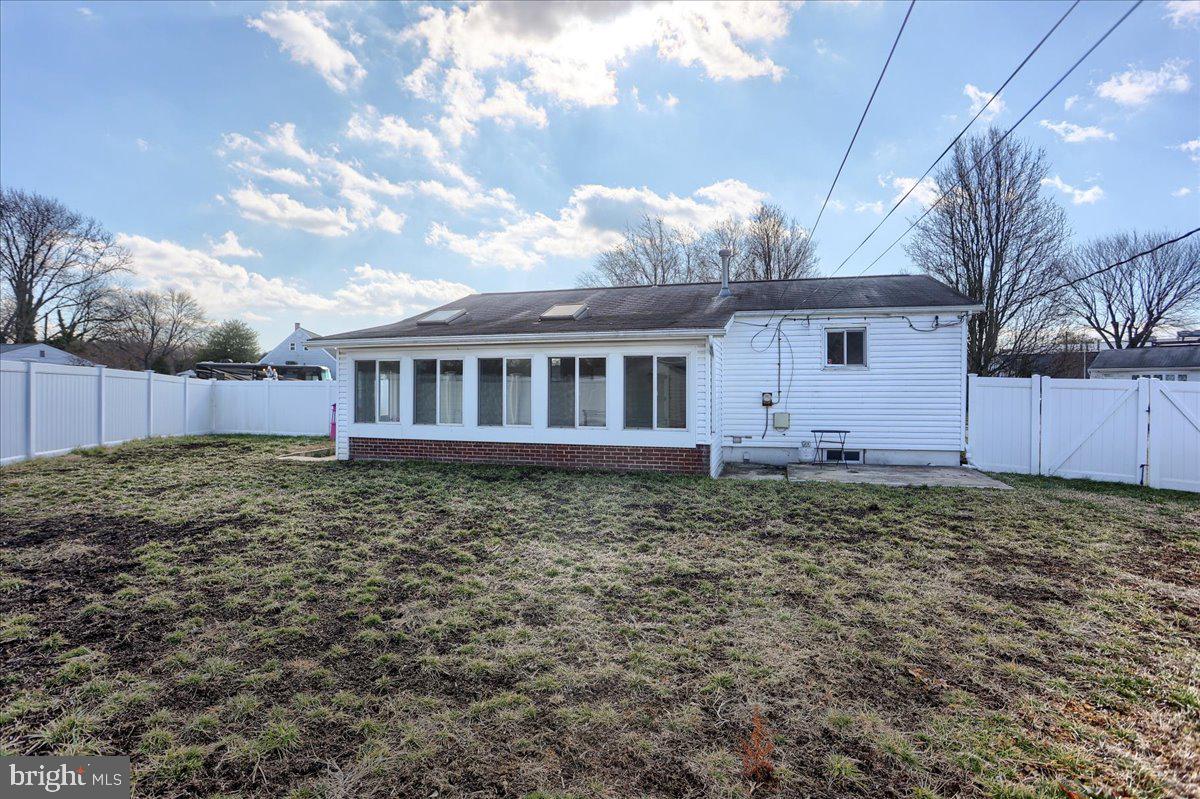 104 Cedarcliff Court Glen Burnie, MD 21060 - Photo 30 of 34 a view of a house with a yard