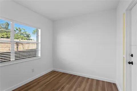 a view of a room that has a window in it