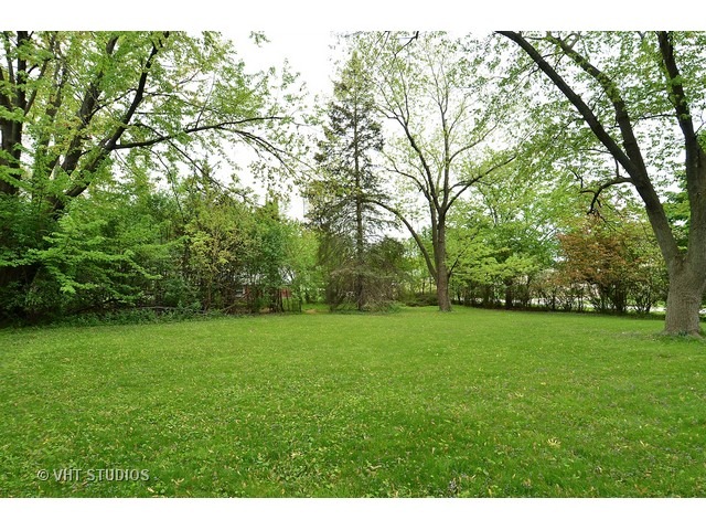 401 Warren Road Glenview, IL 60025 - Photo 9 of 10 a view of a grassy field with trees