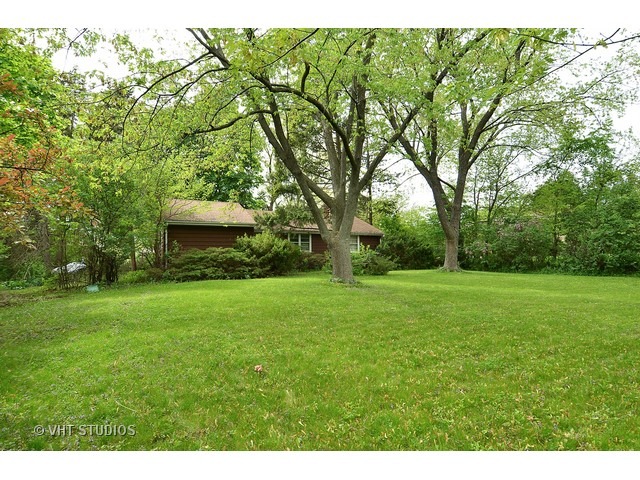401 Warren Road Glenview, IL 60025 - Photo 10 of 10 a view of a backyard with large trees