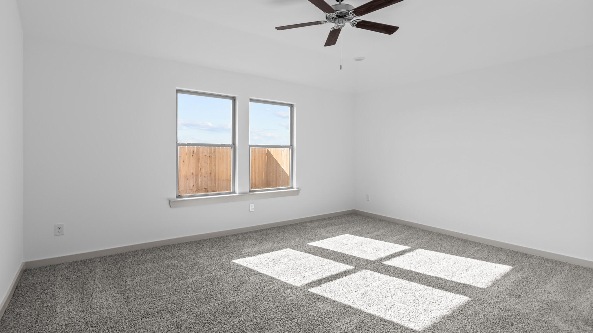 7441 8th Street Lubbock, TX 79416 - Photo 5 of 8 an empty room with a window