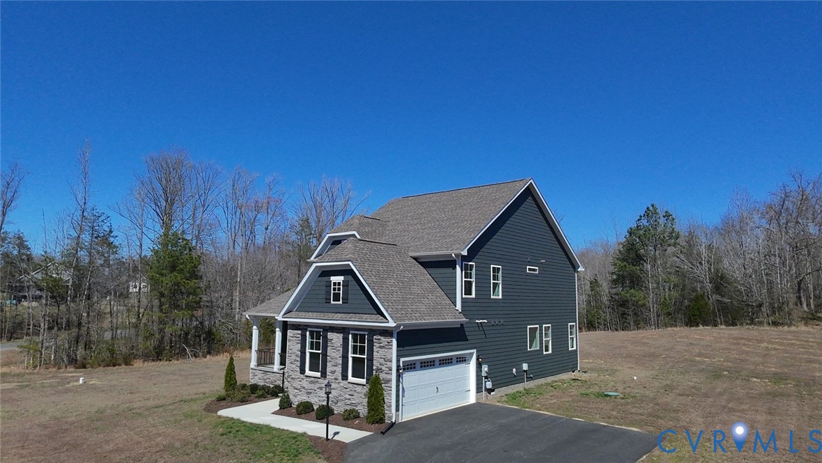 3726 Rocketts Ridge Drive Goochland, VA 23063 - Photo 36 of 38 Nestled amidst rolling hills and lush greenery, th