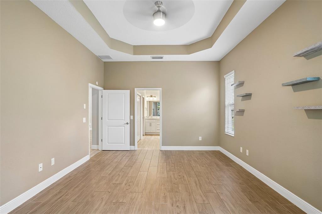 10339 Addison Shore Way Oxford, FL 34484 - Photo 39 of 54 wooden floor in an empty room
