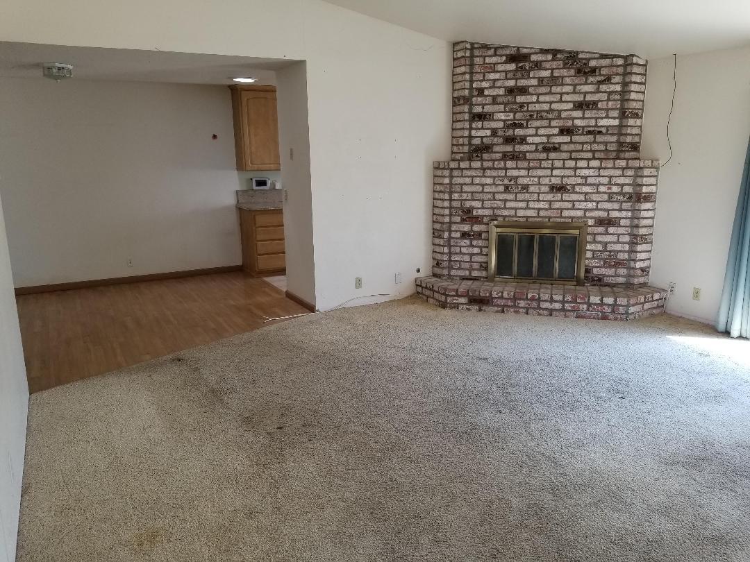 569 Powell Street Salinas, CA 93907 - Photo 14 of 14 a view of an empty room with a fireplace