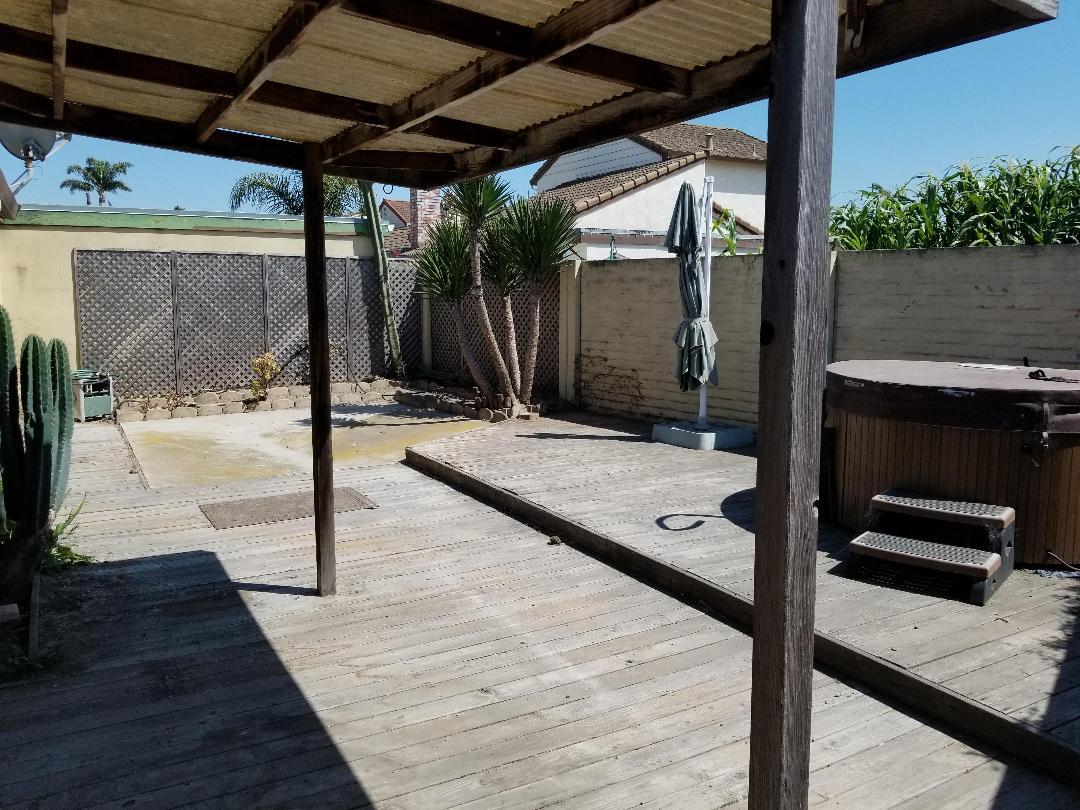 569 Powell Street Salinas, CA 93907 - Photo 4 of 14 a bathroom with a tub and shower