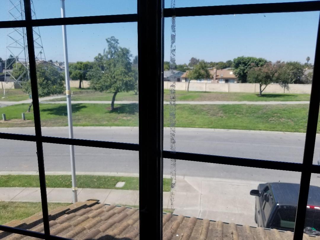 569 Powell Street Salinas, CA 93907 - Photo 6 of 14 a view of a yard from a window