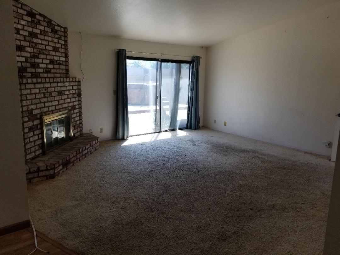 569 Powell Street Salinas, CA 93907 - Photo 8 of 14 an empty room with windows