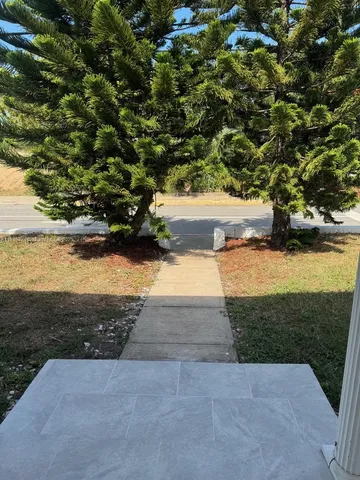 a view of yard with an outdoor space