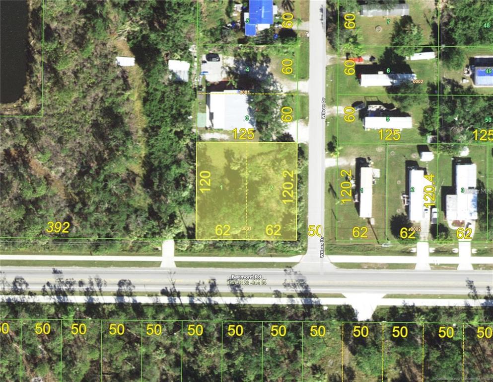 27760 Bermont Road Punta Gorda, FL 33982 - Photo 18 of 18 a view of building with yard