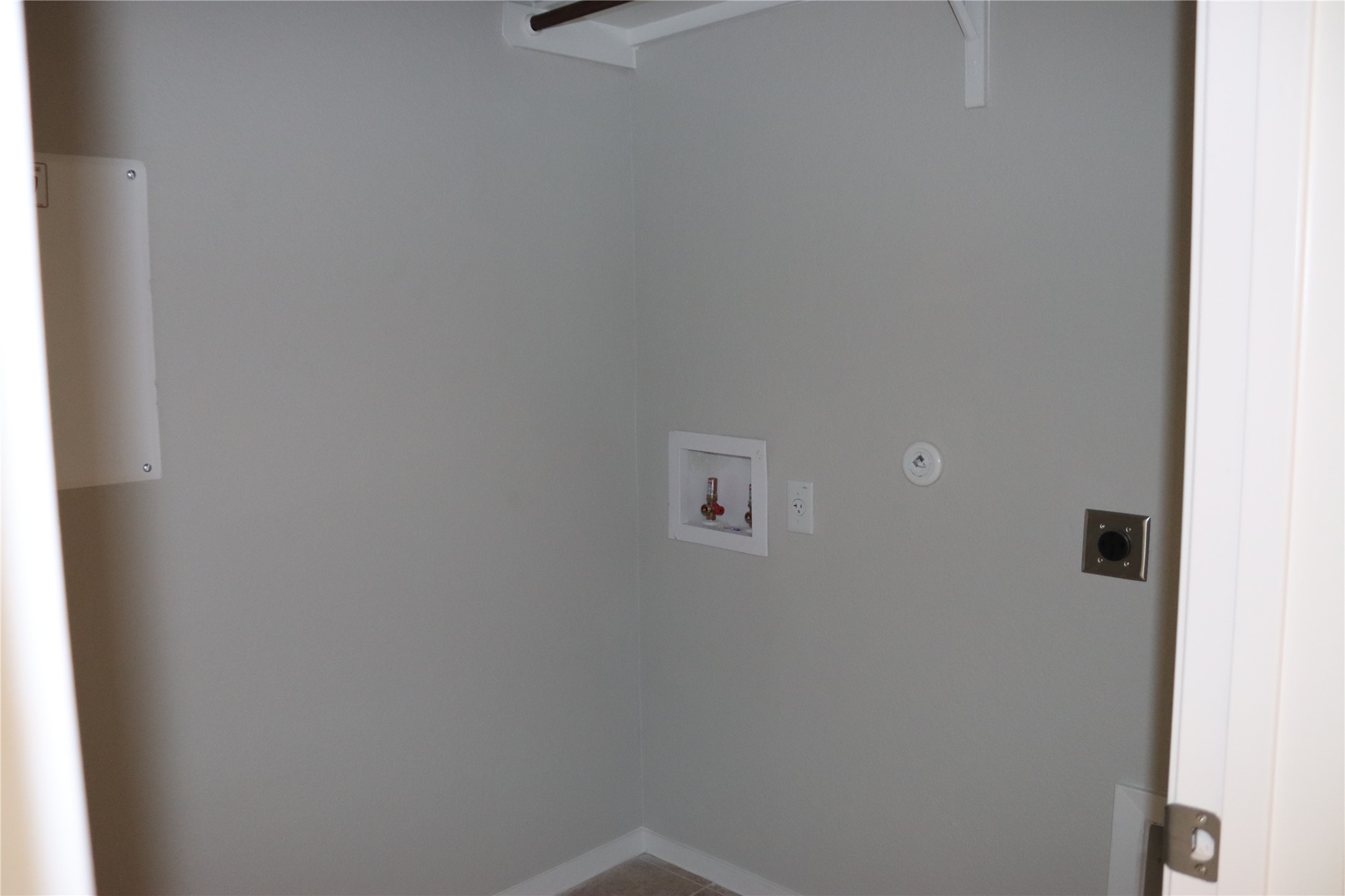 225 Graver Street Georgetown, TX 78626 - Photo 13 of 19 Laundry room with hookup for a washing machine and electric dryer hookup