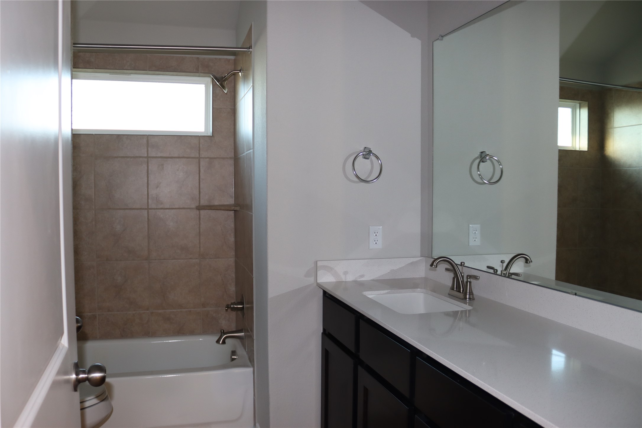 225 Graver Street Georgetown, TX 78626 - Photo 8 of 19 Bathroom featuring tub / shower combination and vanity