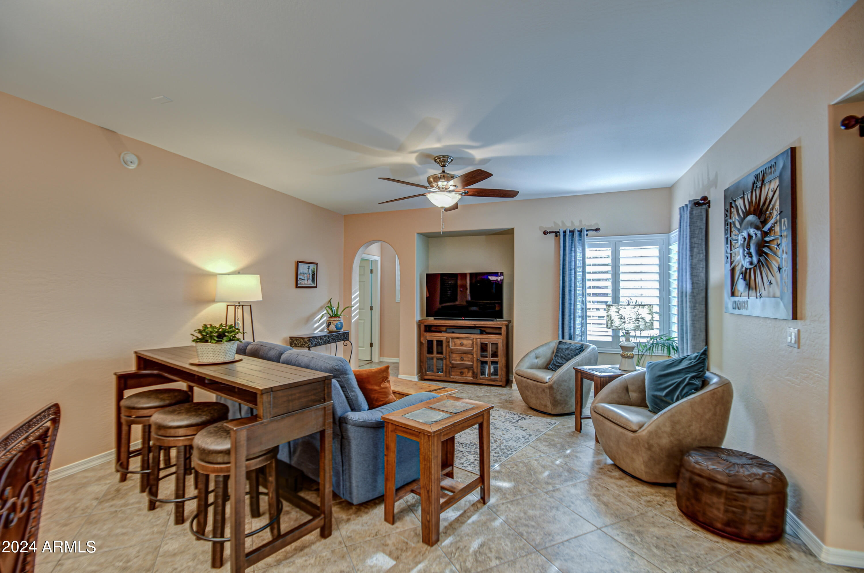 3935 East Rough Rider Road, Unit 1120 Phoenix, AZ 85050 - Photo 12 of 40 Living Room 3