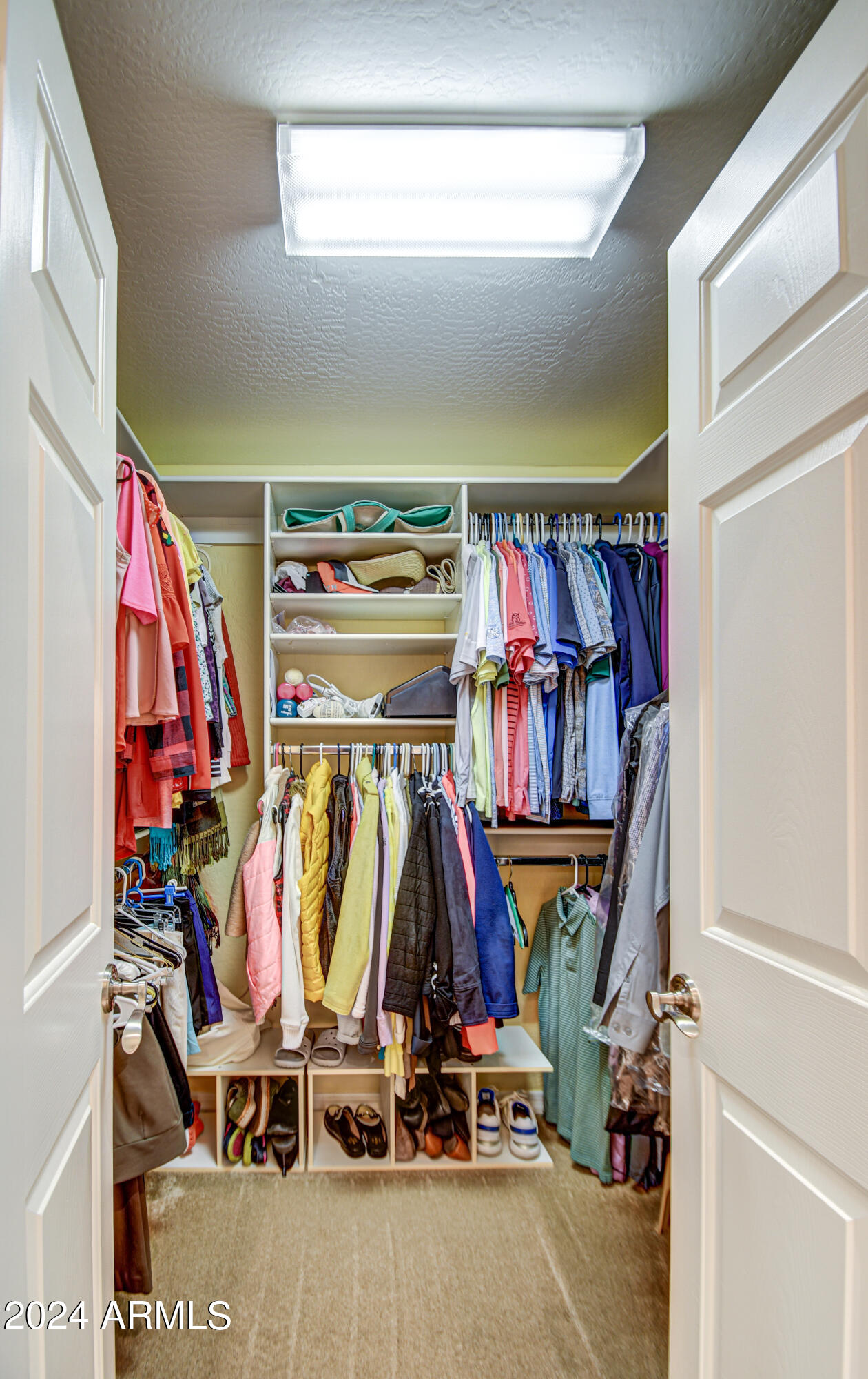 3935 East Rough Rider Road, Unit 1120 Phoenix, AZ 85050 - Photo 17 of 40 Primary Bed Closet