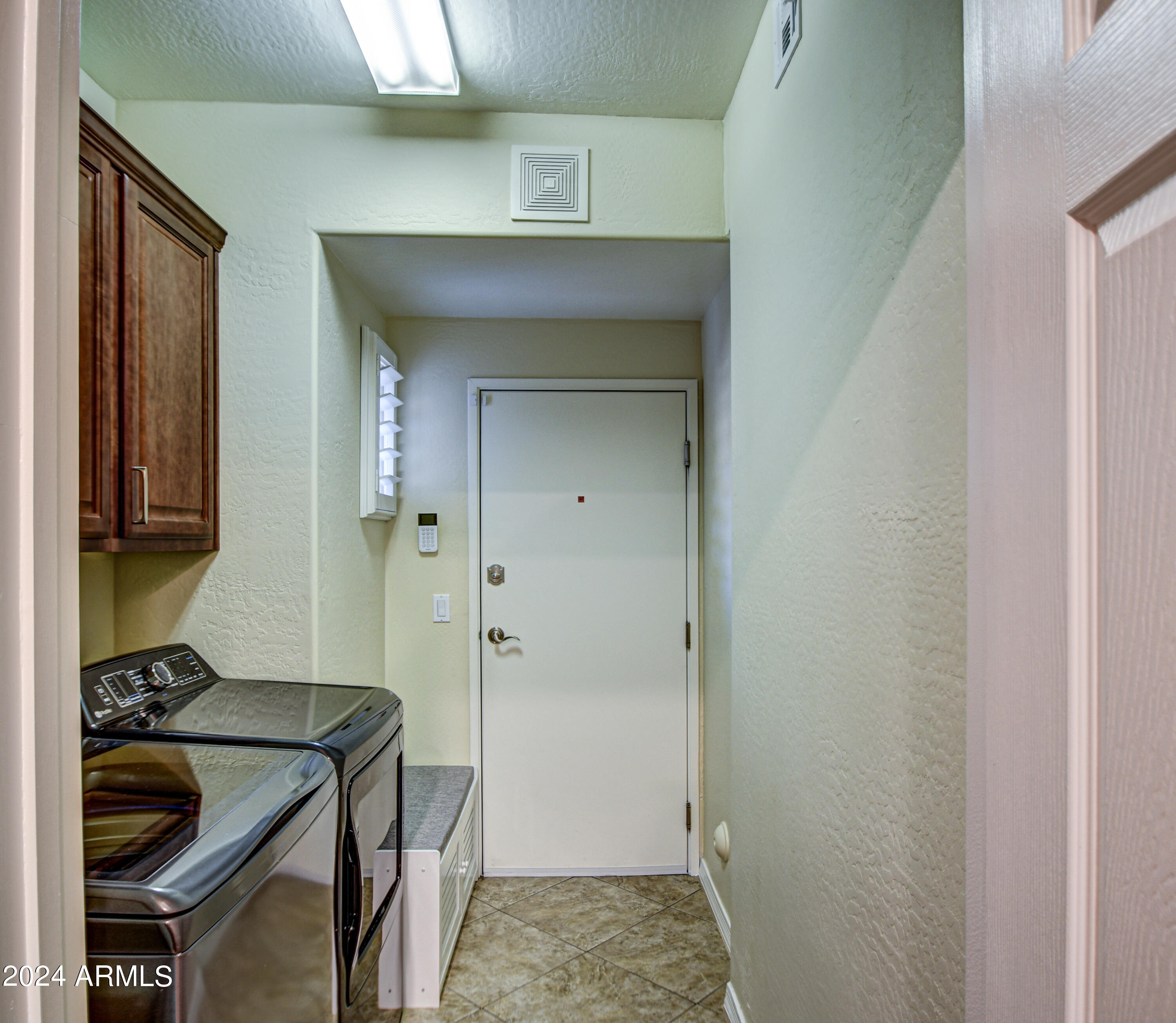 3935 East Rough Rider Road, Unit 1120 Phoenix, AZ 85050 - Photo 22 of 40 Laundry