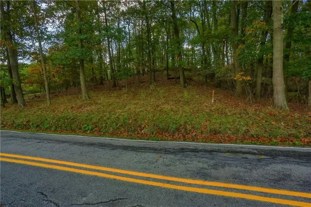 a view of swimming pool from a yard