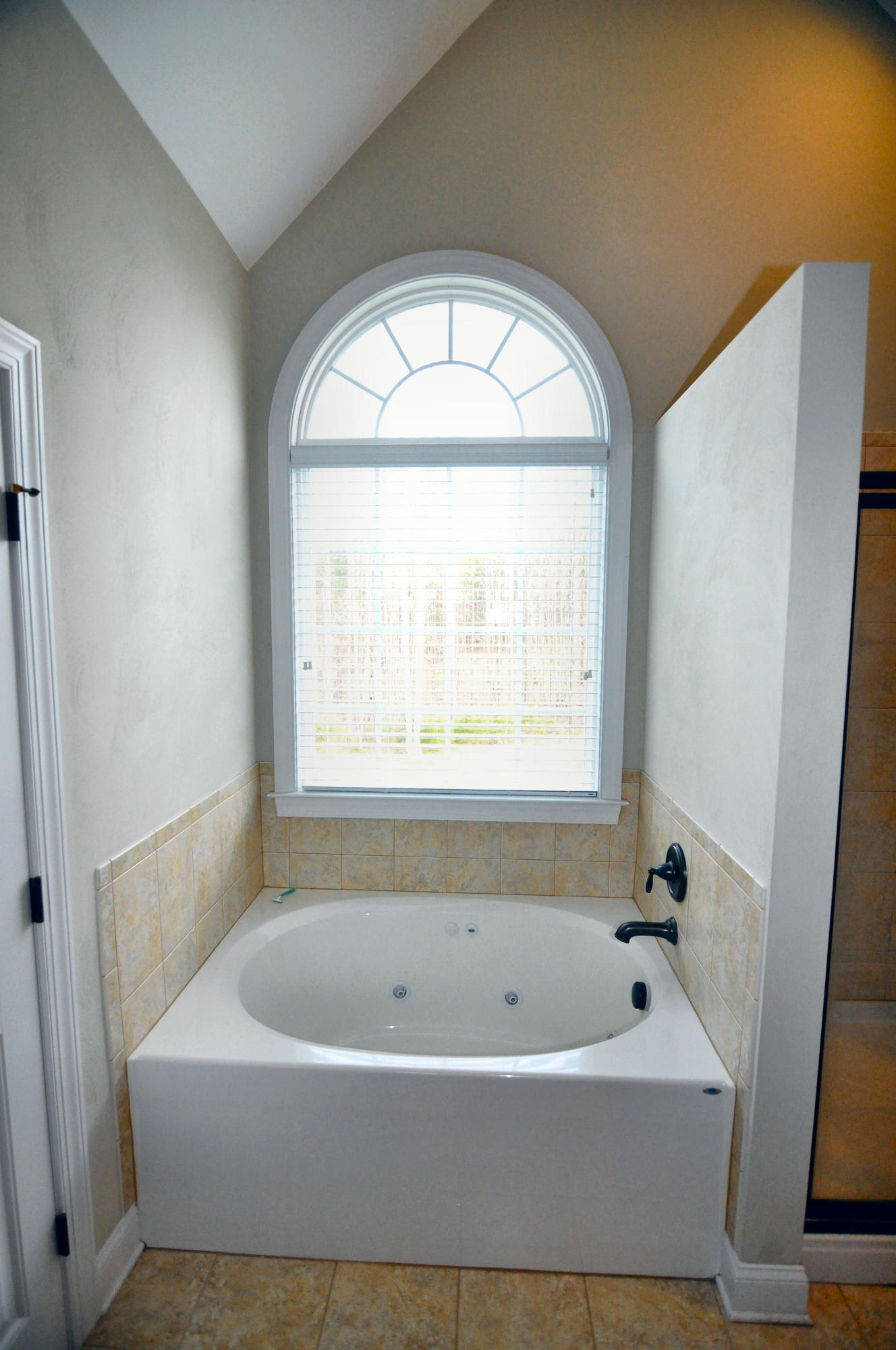632 Thornblade Way Blue Ridge, VA 24064 - Photo 22 of 41 a bathroom with a bathtub and a window