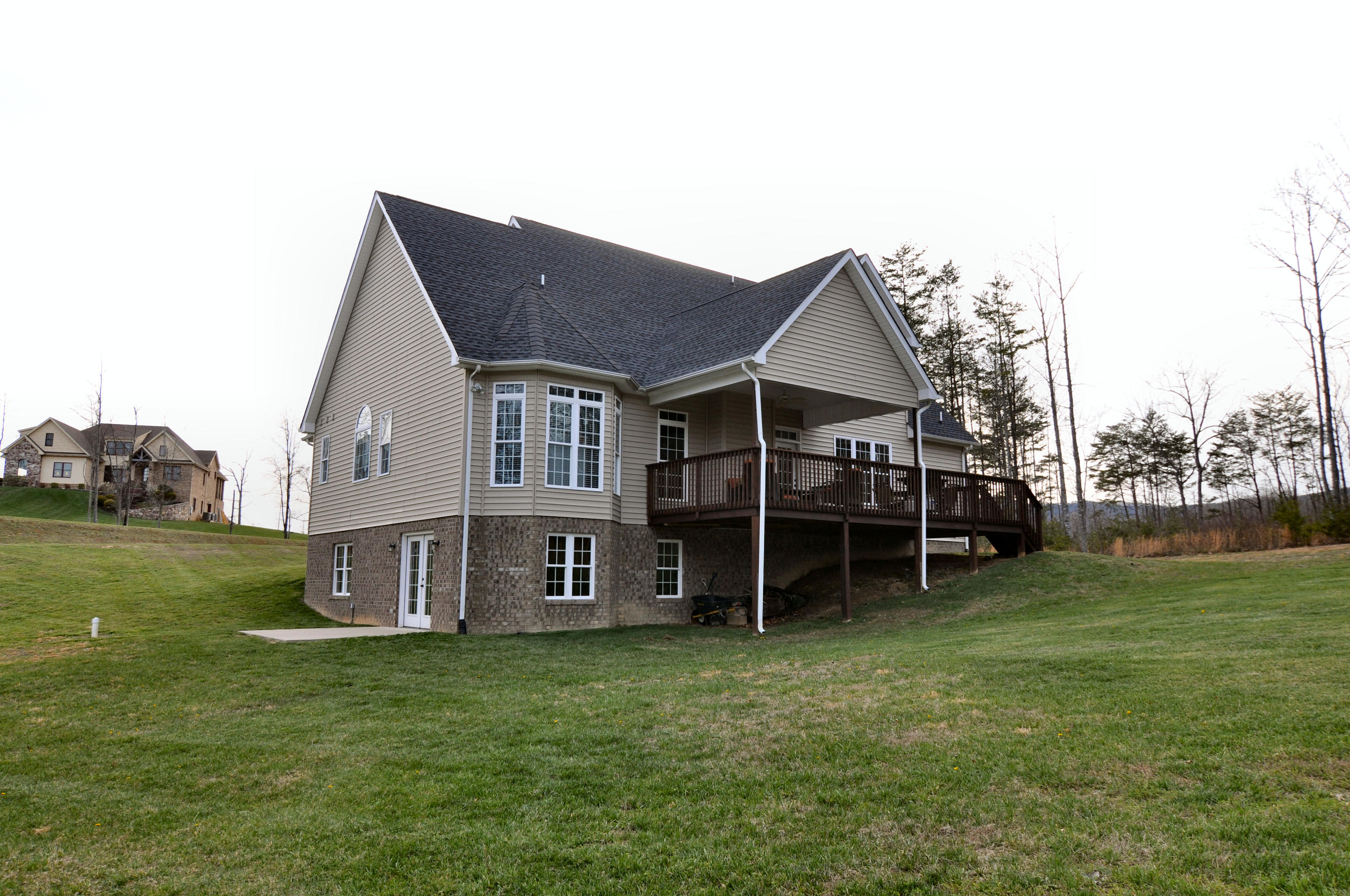 632 Thornblade Way Blue Ridge, VA 24064 - Photo 40 of 41 a view of a house with a backyard and a garden