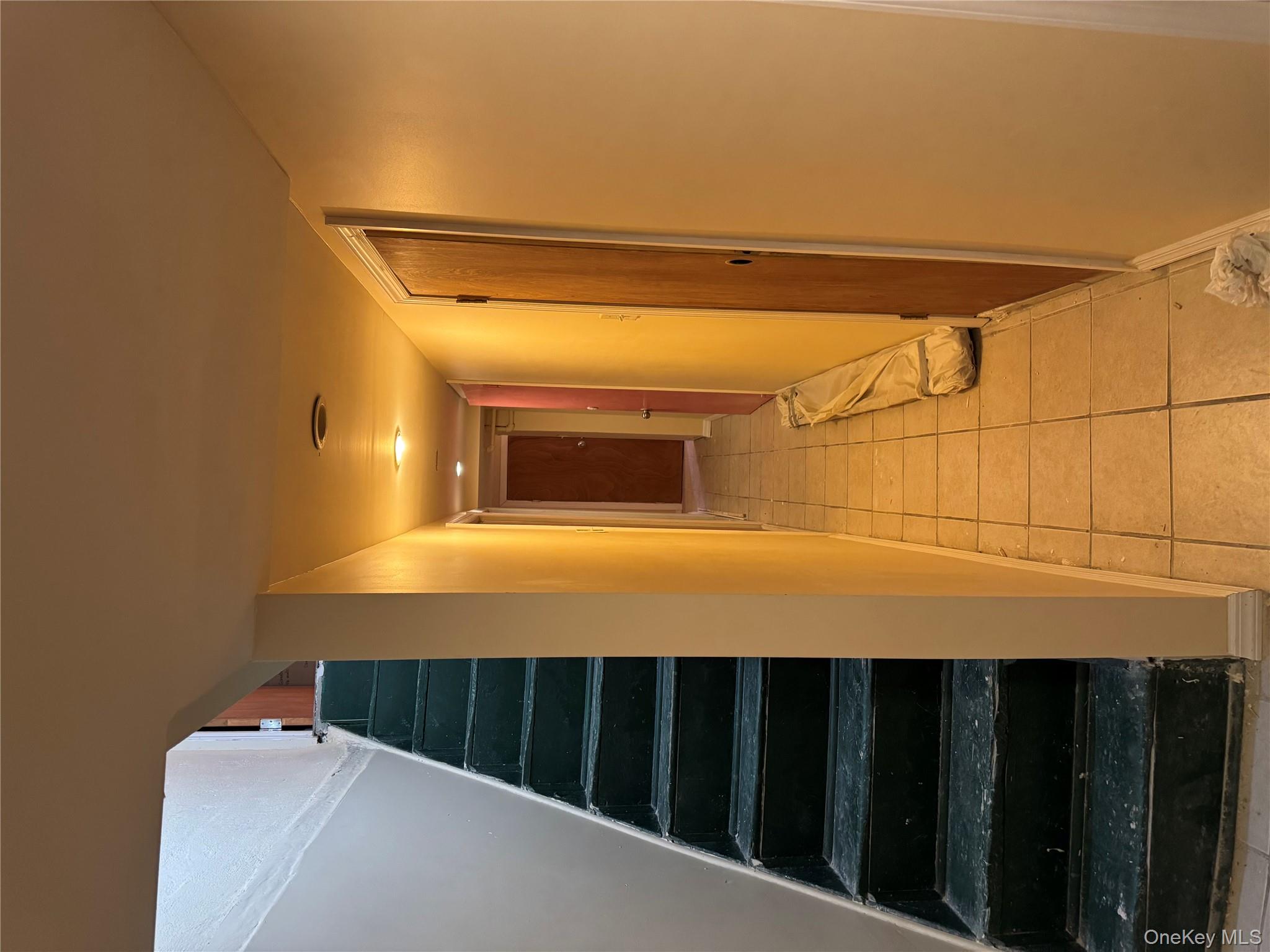 776 Hewitt Place Bronx, NY 10455 - Photo 16 of 20 a view of entryway with wooden floor