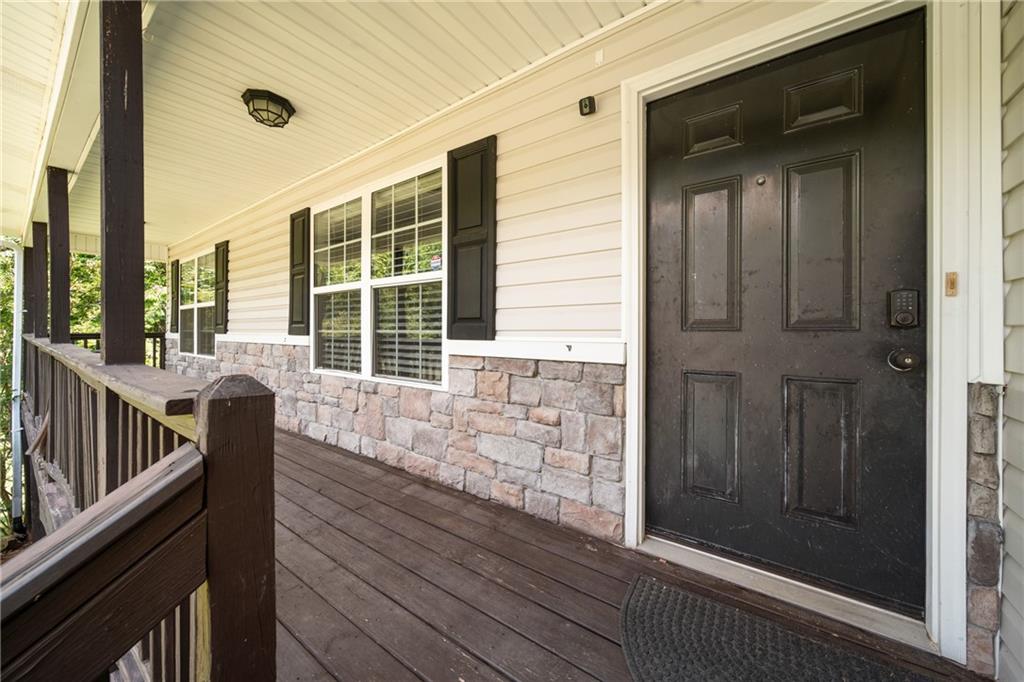 921 Pace Road Hiram, GA 30141 - Photo 4 of 41 a view of front door and deck of the house