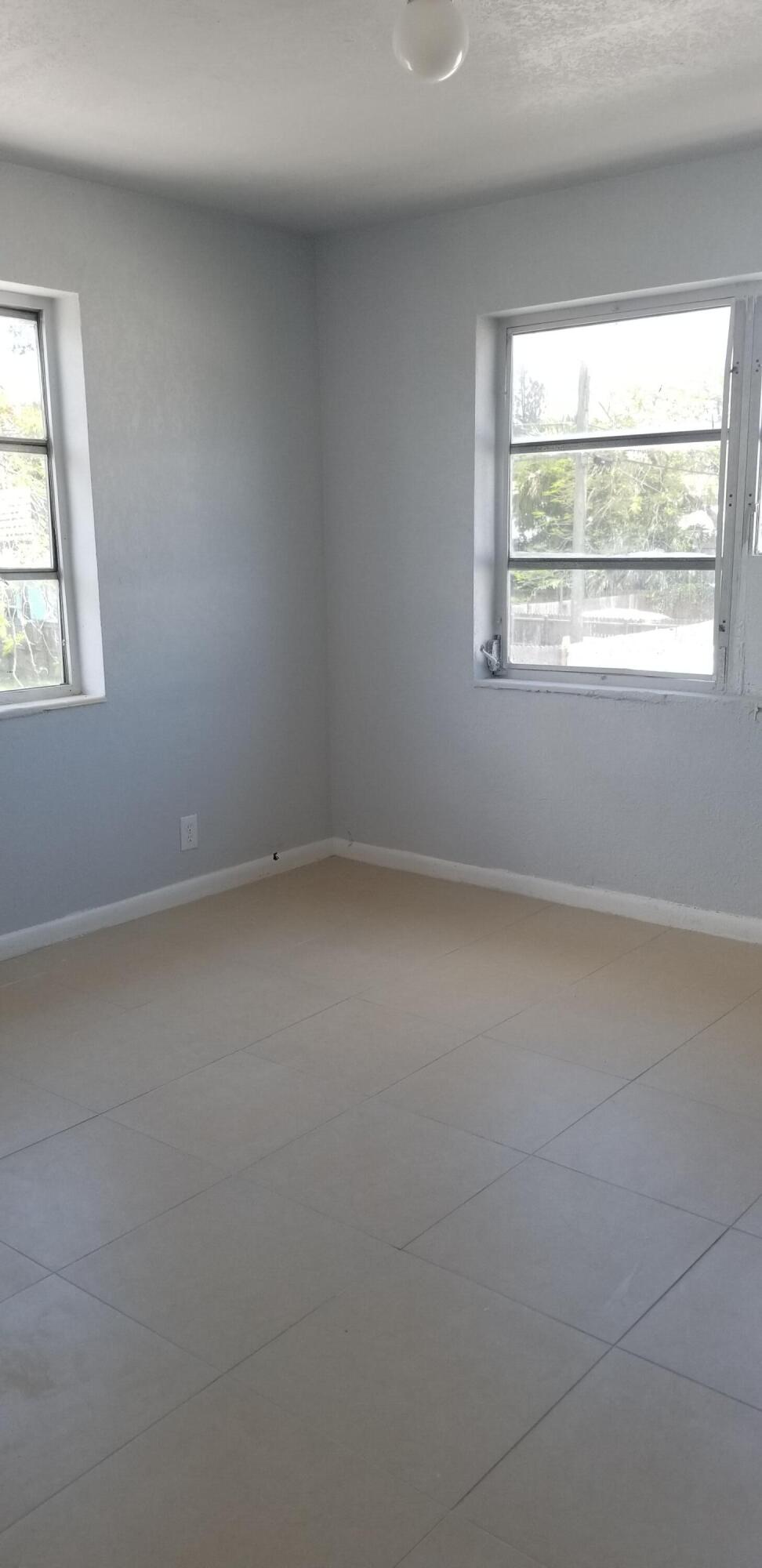 919 6th Street, Unit 15 West Palm Beach, FL 33401 - Photo 14 of 35 an empty room with a window