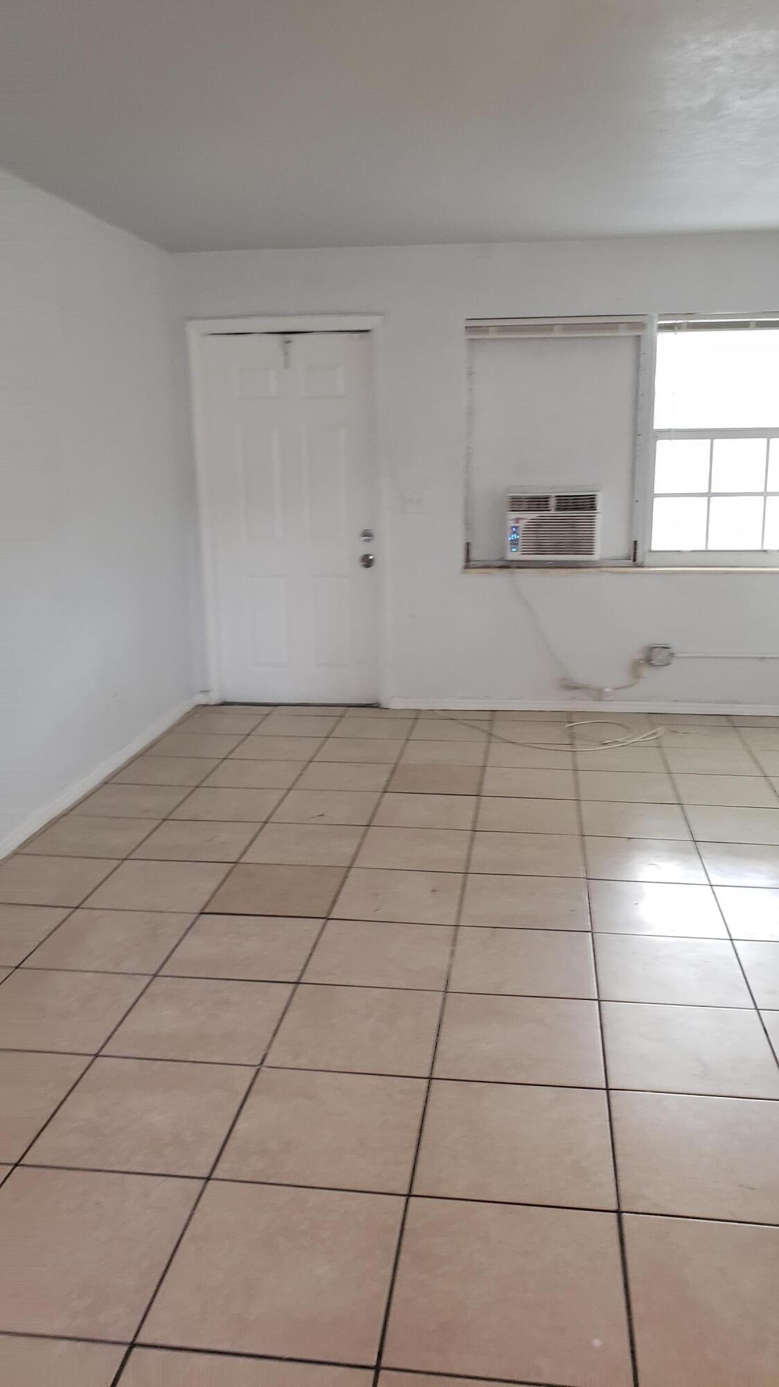 919 6th Street, Unit 15 West Palm Beach, FL 33401 - Photo 16 of 35 a view of an empty room and window