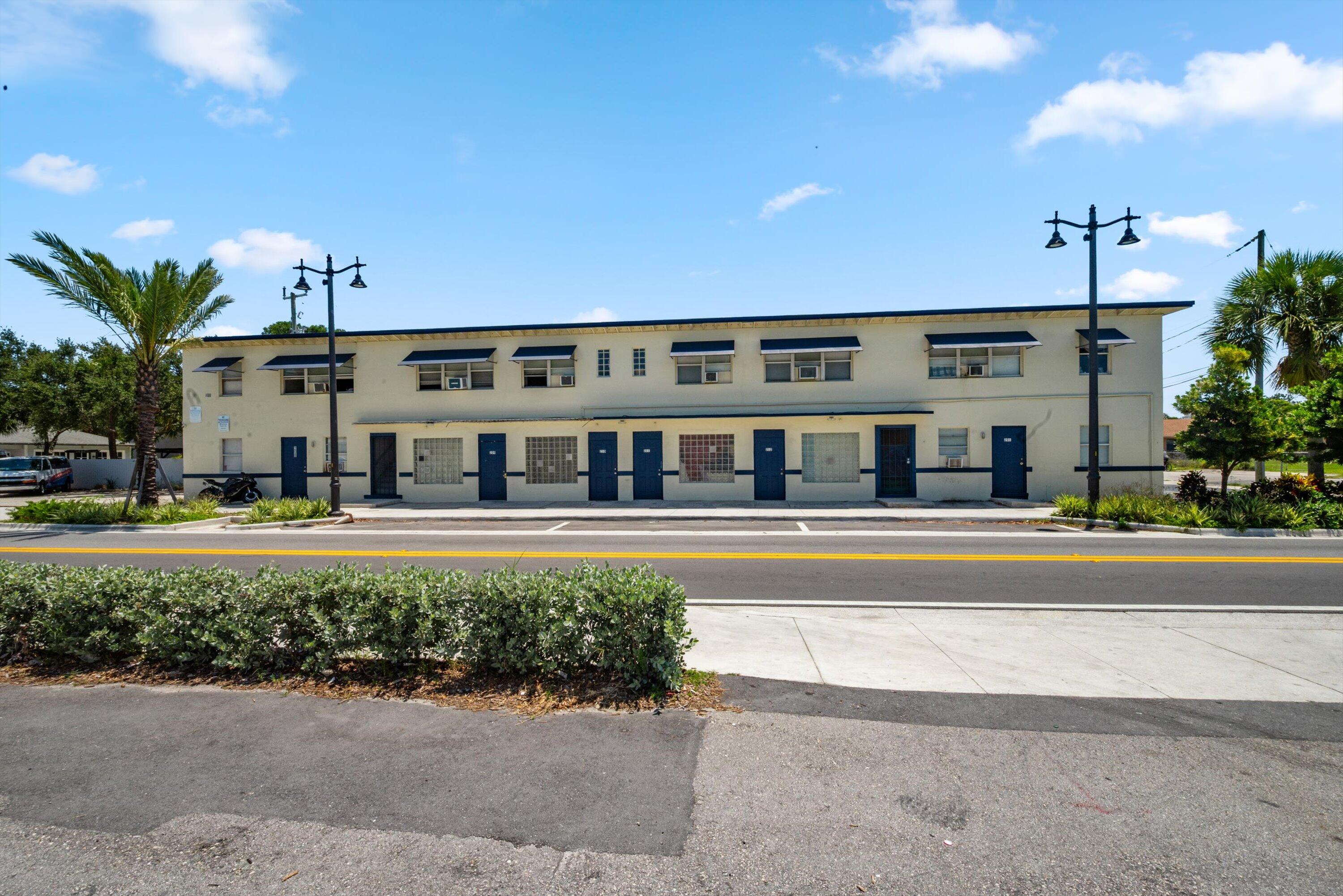 919 6th Street, Unit 15 West Palm Beach, FL 33401 - Photo 2 of 35 a house view with a sitting space and garden