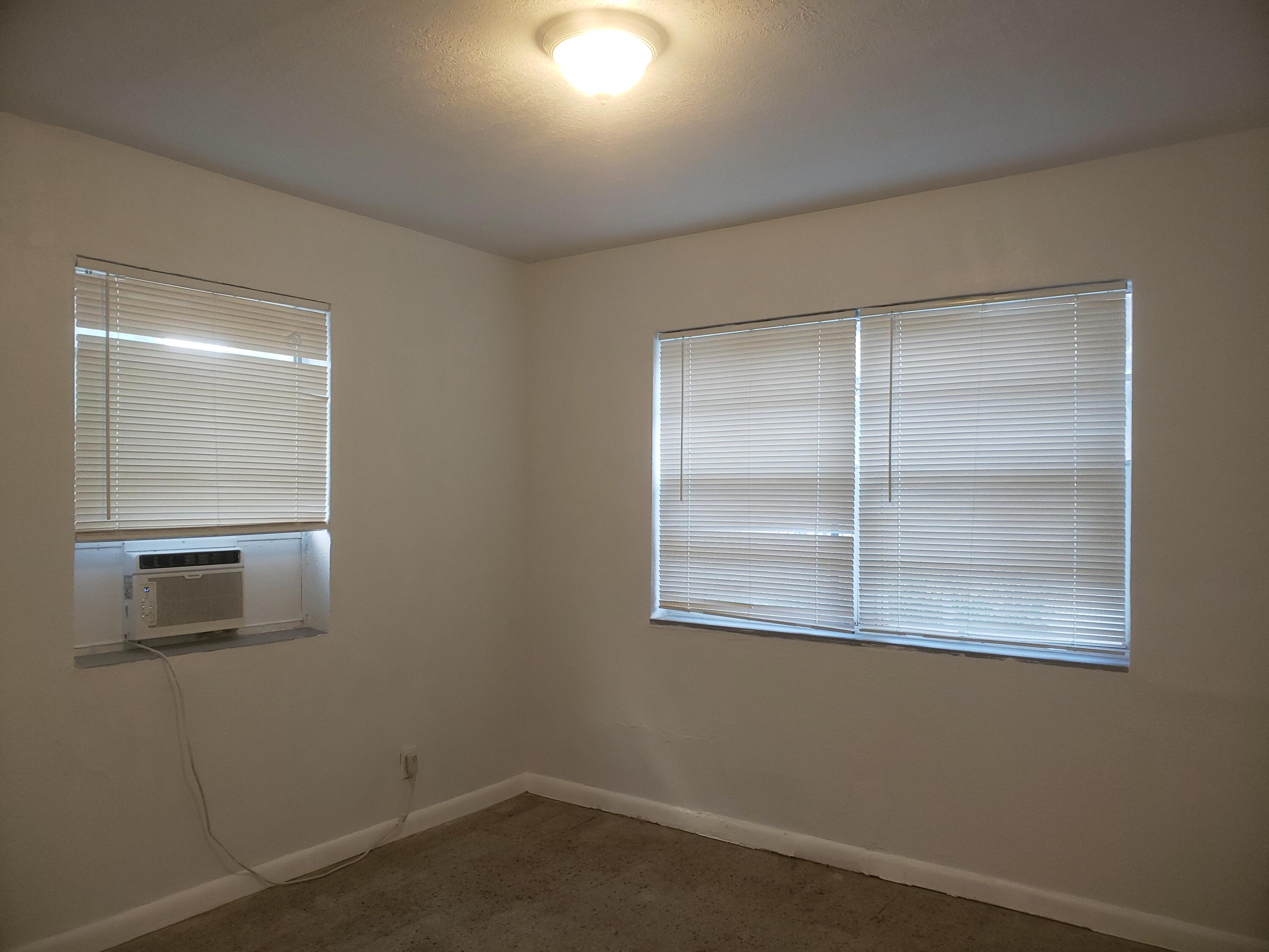 919 6th Street, Unit 15 West Palm Beach, FL 33401 - Photo 22 of 35 an empty room with a window