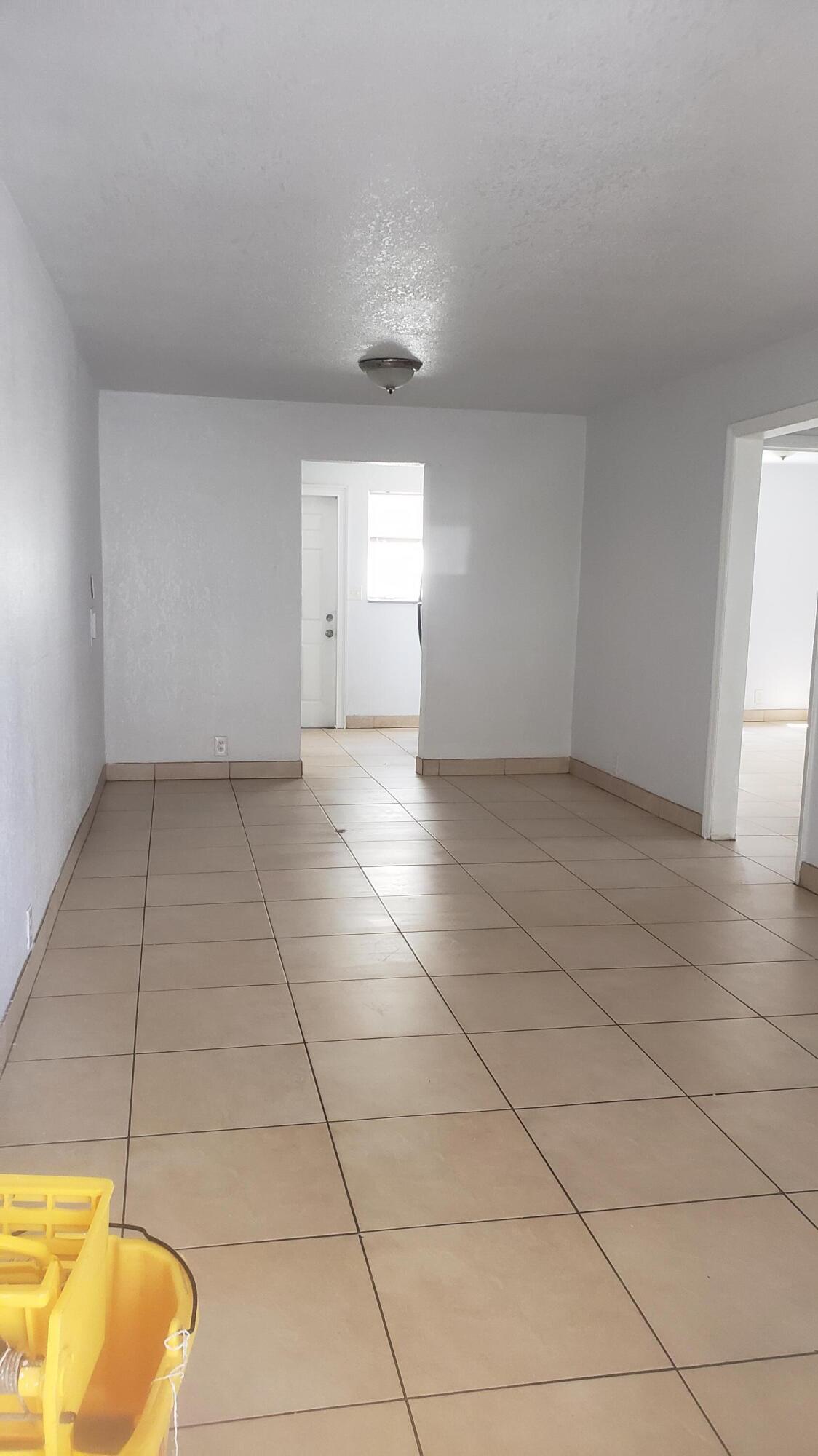 919 6th Street, Unit 15 West Palm Beach, FL 33401 - Photo 27 of 35 a view of an empty room with a window
