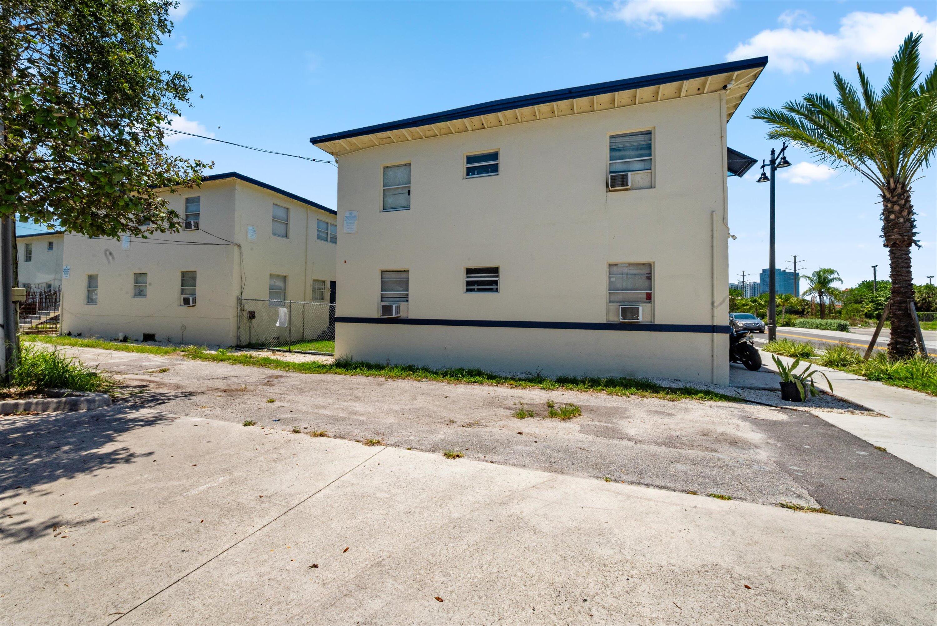 919 6th Street, Unit 15 West Palm Beach, FL 33401 - Photo 4 of 35 a view of a house with a road