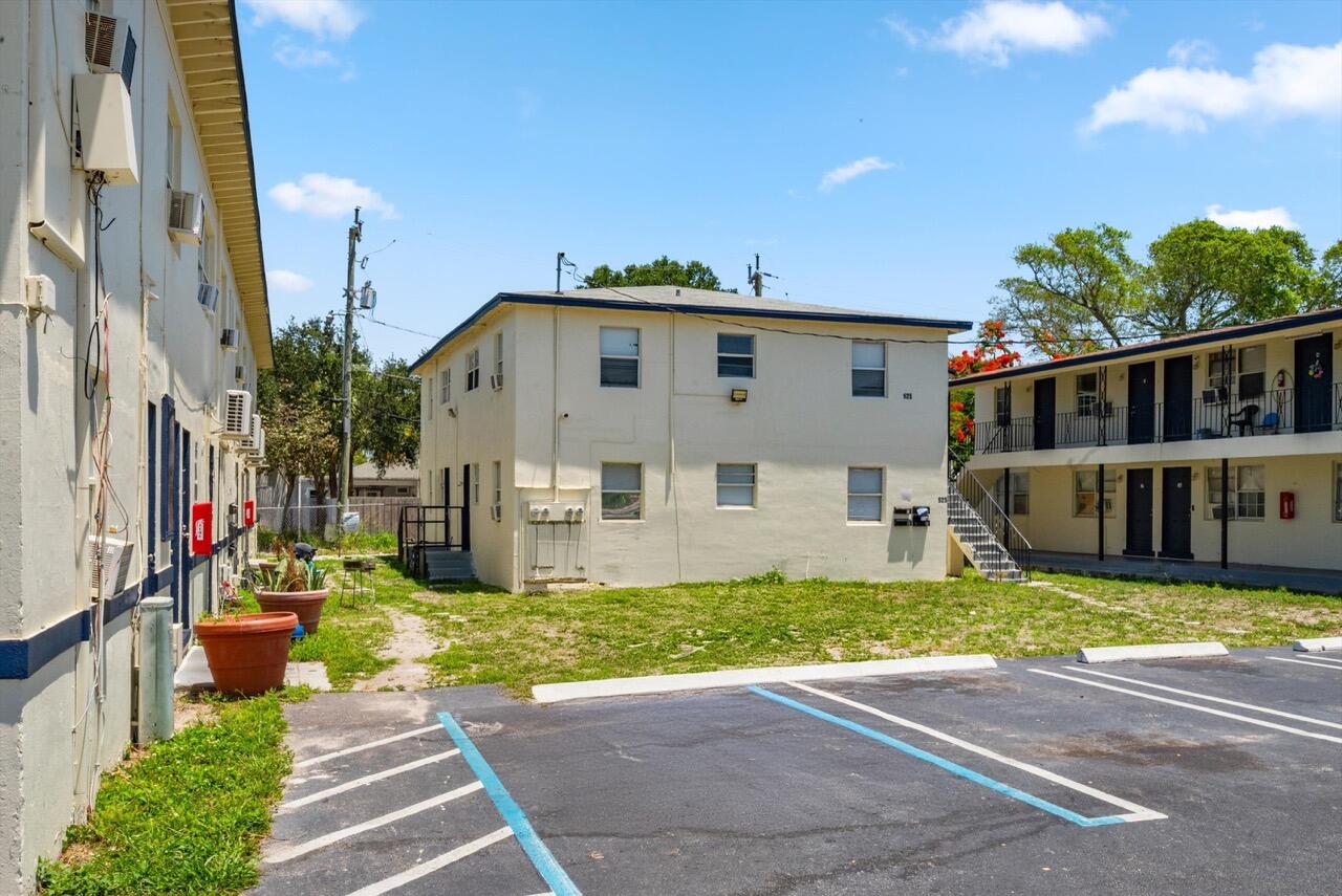 919 6th Street, Unit 15 West Palm Beach, FL 33401 - Photo 8 of 35 a view of a house with a yard and plants
