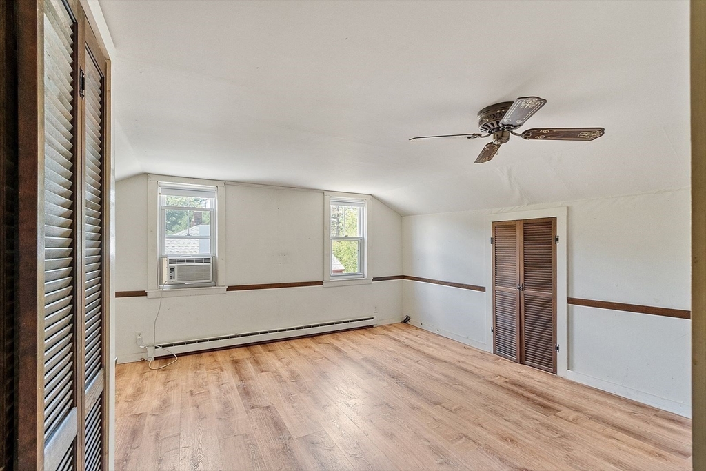 31 Pinedale Road Athol, MA 01331 - Photo 21 of 41 an empty room with windows and fan