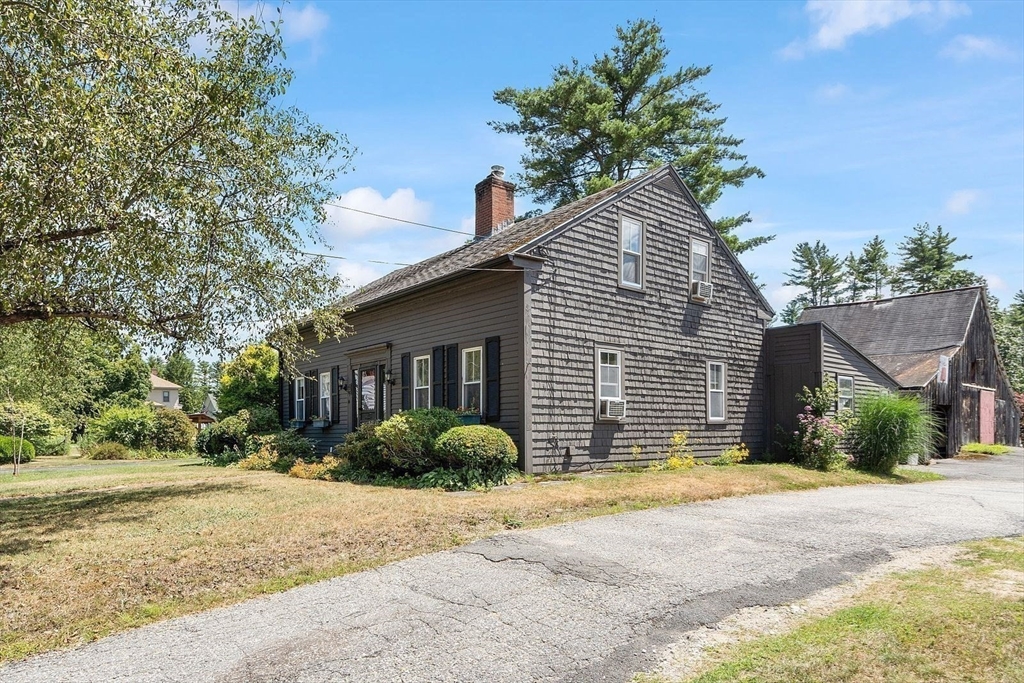 31 Pinedale Road Athol, MA 01331 - Photo 3 of 41 a view of a house with a small yard and plants