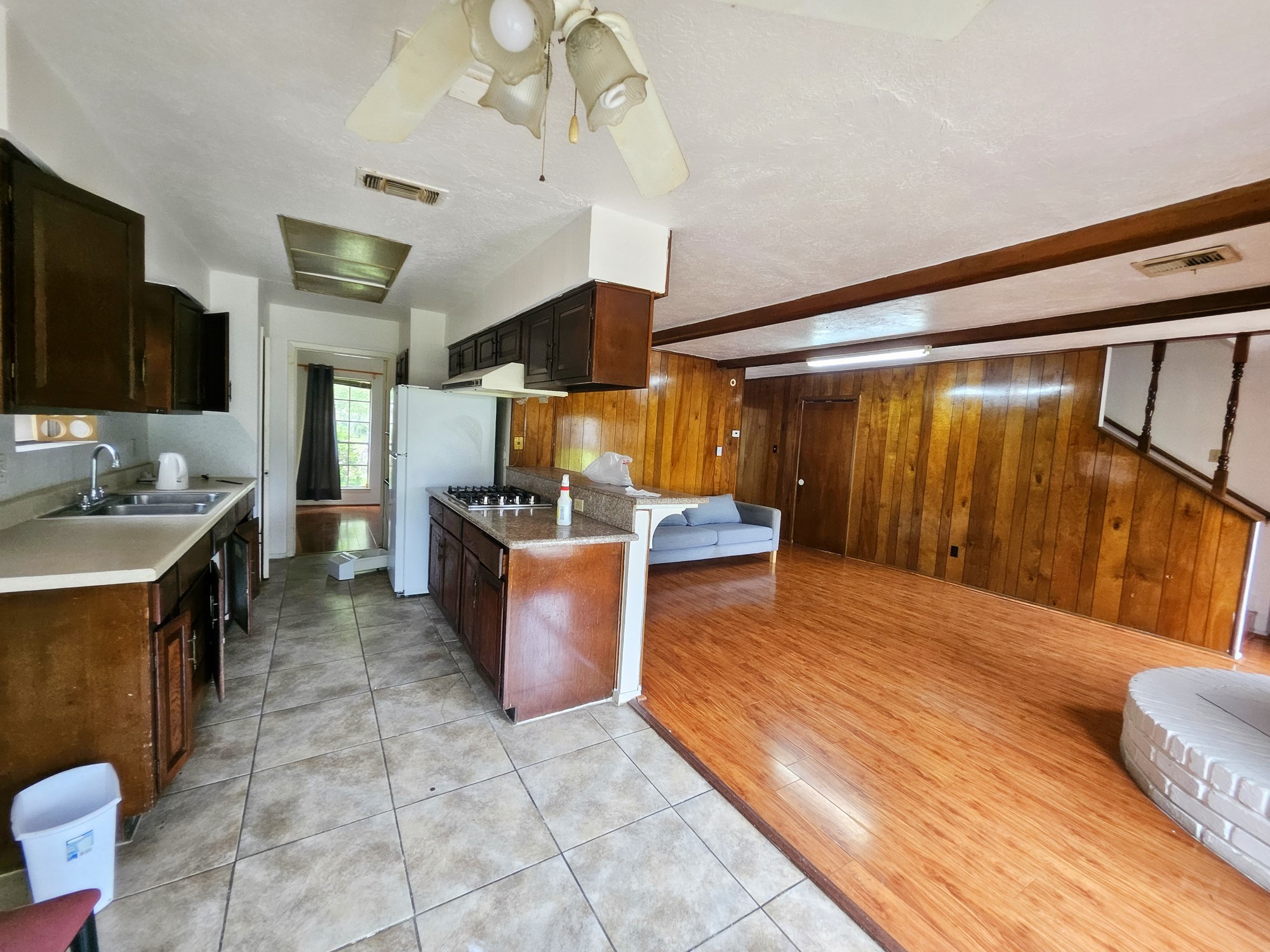 9318 Neff Street Houston, TX 77036 - Photo 3 of 10 a living room with furniture and a flat screen tv