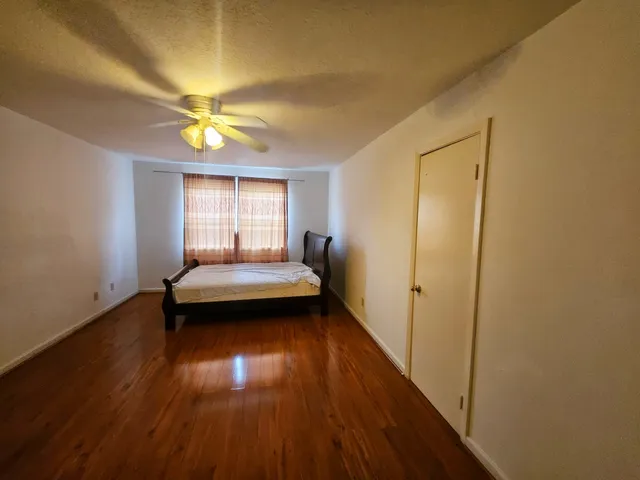 a view of livingroom with furniture wooden floor and window