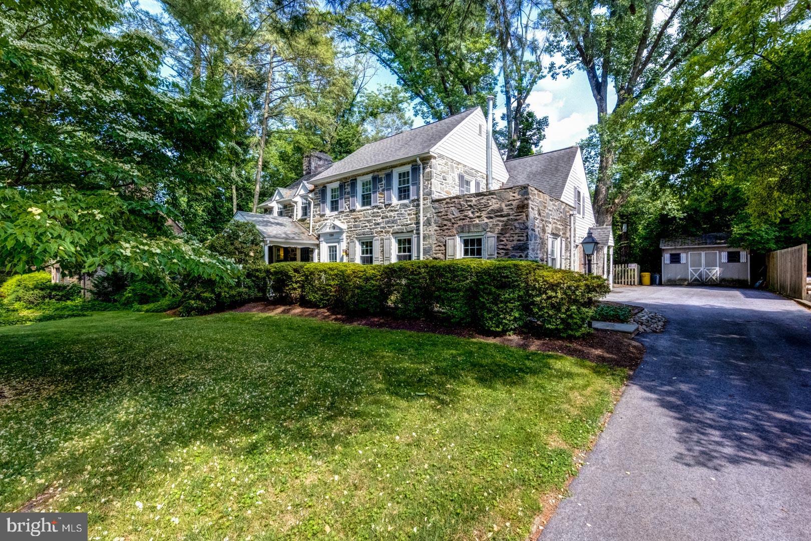 Main Line Center Hall Stone Colonial