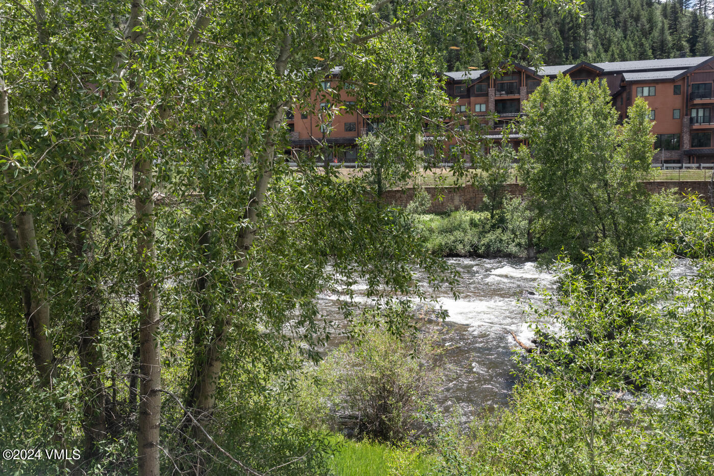 170 Hurd, Unit C102 Avon, CO 81620 - Photo 11 of 29 a view of a house with a tree
