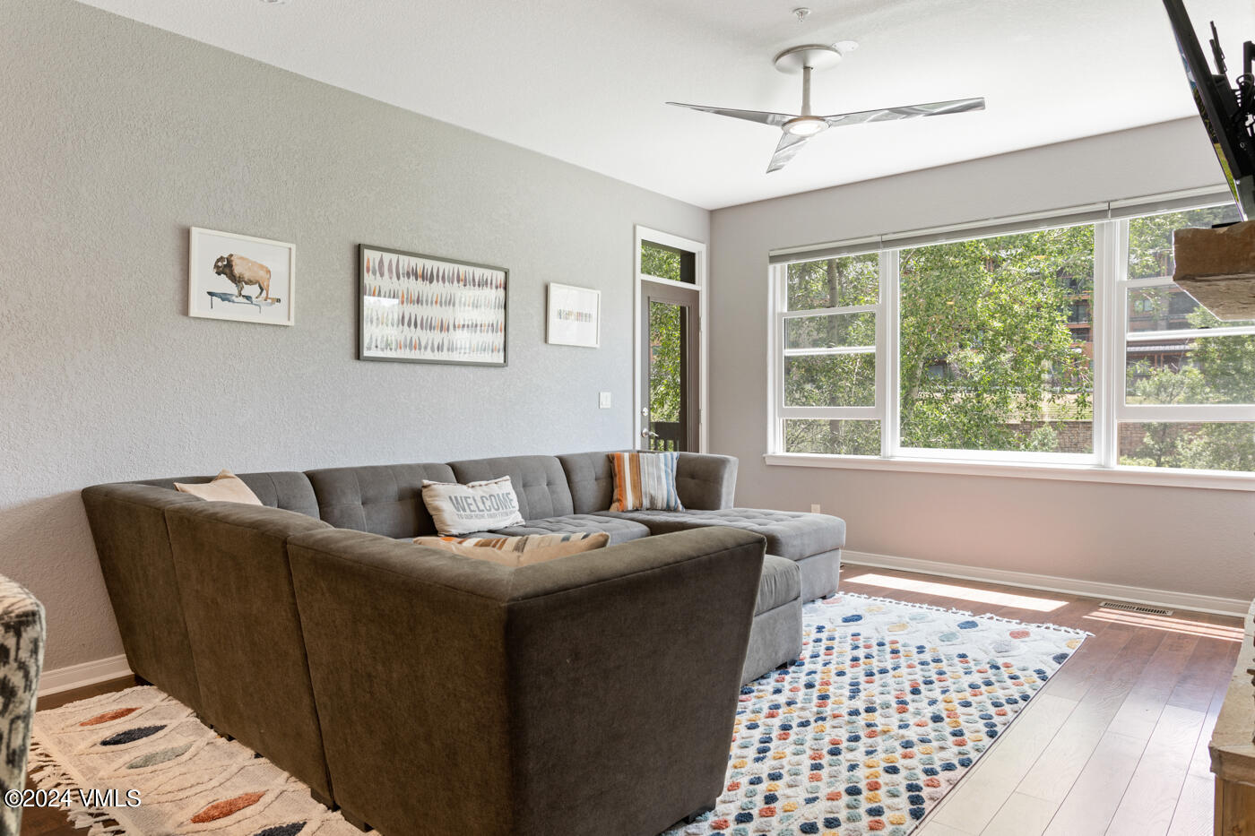 170 Hurd, Unit C102 Avon, CO 81620 - Photo 5 of 29 a living room with furniture and a window