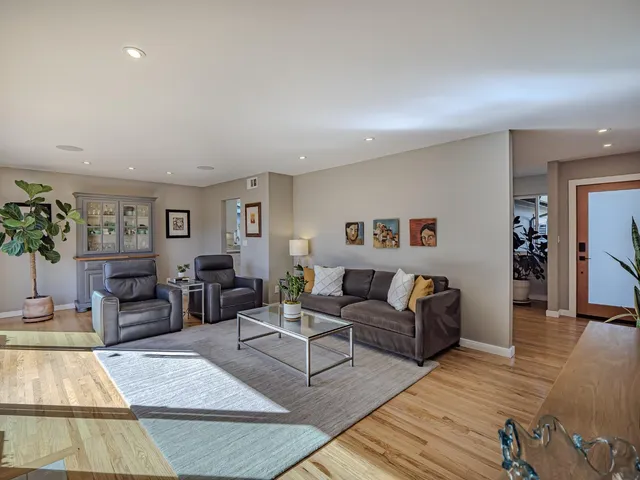 a living room with furniture and a couch