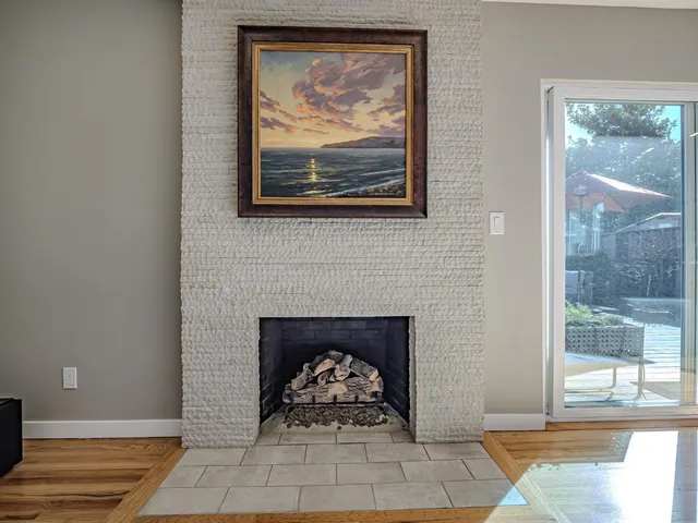 a living room with a fireplace